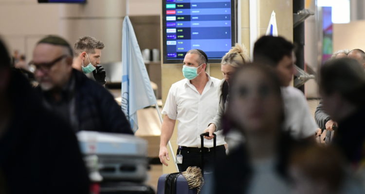 Israel’s Health Ministry calls for tough new travel rules, including keeping Israelis in