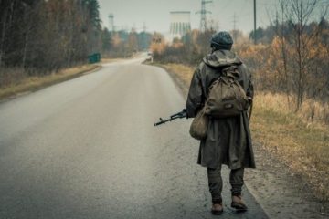 Soldier on a road