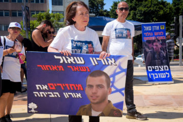 Supporters and family members of late Israeli soldier Oron Shaul hold a protest in Tel Aviv calling on the government to return his body 5 years after it was seized by Hamas, on August 16, 2019. (Avshalom Shoshoni/Flash90)