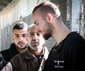 Samar Arbid (in brown) is brought to the courtroom for his trial at the Israel's Ofer military court near Ramallah on February 17, 2020. Arbid is accused of masterminding the terrorist attack which killed 17-year-old Israeli girl Rina Shnerb. (Flash90)