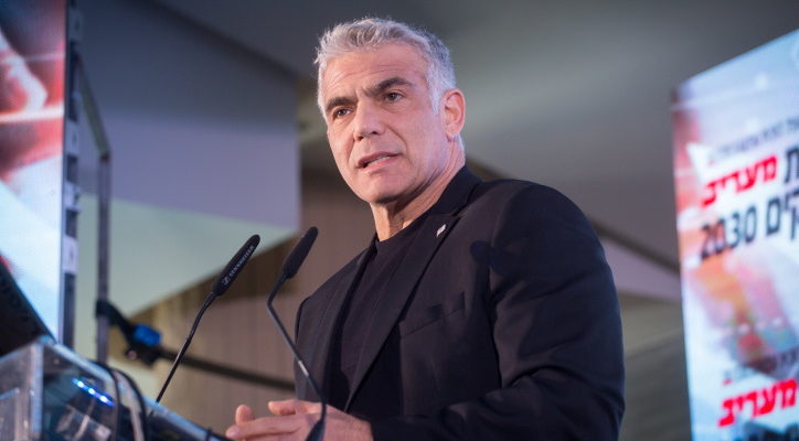 Lapid meets again with Palestinian minister calling for two-state solution