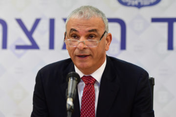 Finance Minister Moshe Kahlon speaks at an emergency meeting to discuss the economic fallout of the coronavirus crisis on the Israeli economy in Tel Aviv on March 01, 2020. (Flash90/Avshalom Sassoni)