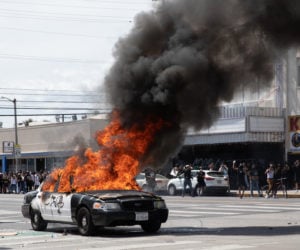 Police car being burned