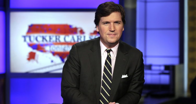Tucker Carlson denounces ex-writer who posted racist comments