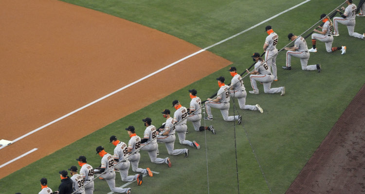 ‘I am a Christian’: Giants pitcher stands as other players kneel