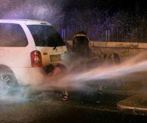 Water cannons protest