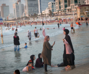 Arabs at the beach in Tel Aviv
