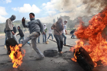 Clashes between Israeli border police and Palestinian demonstrators