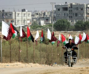 Qatar and Palestinian flags in Gaza