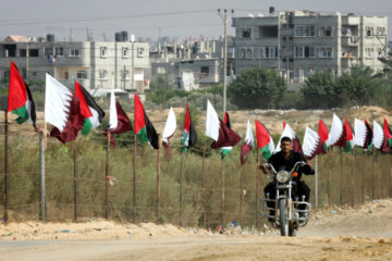 Qatar and Palestinian flags in Gaza