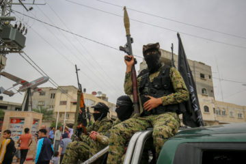 Terrorists from the Hamas Ezzedeen Al-Qassam Brigades at the Deir Al Balah refugee camp in Gaza