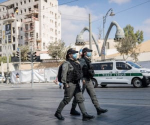 Police patrol outside the Mahane Yehuda Market in Jerusalem