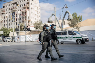 Police patrol outside the Mahane Yehuda Market in Jerusalem
