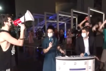 Left-wing protesters disrupt Channel 20 News broadcast on September 29, 2020. (YouTube/Channel 20 News/Screenshot)
