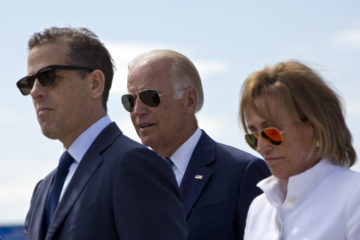 Then-U.S. Vice President Joe Biden, seen with his son Hunter Biden, left, and his sister Valerie Biden Owens, right, in Sojevo, Kosovo, on Wednesday, Aug. 17, 2016. (AP Photo/Visar Kryeziu)