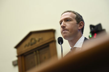 Facebook Chief Executive Officer Mark Zuckerberg testifies before the House Financial Services Committee on Capitol Hill in Washington, Wednesday, Oct. 23, 2019, to discuss his plans for the new cryptocurrency Libra. (AP Photo/Susan Walsh)