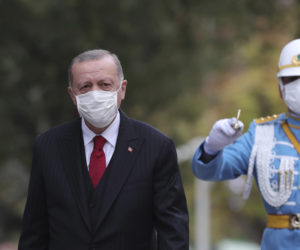 Turkey's President Recep Tayyip Erdogan, outside the Turkish parliament, in Ankara, Turkey, Thursday, Oct. 1, 2020. (AP Photo/Pool/Turkish Presidency)