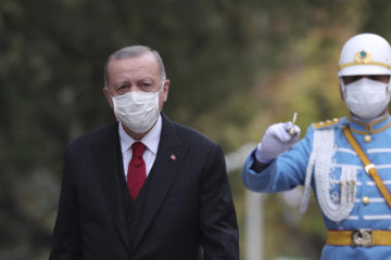 Turkey's President Recep Tayyip Erdogan, outside the Turkish parliament, in Ankara, Turkey, Thursday, Oct. 1, 2020. (AP Photo/Pool/Turkish Presidency)