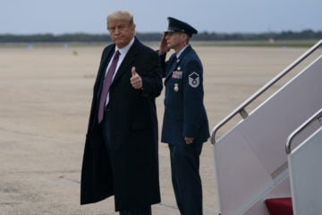 President Donald Trump gives a thumbs up as he arrives at Andrews Air Force Base on Thursday, Oct. 1, 2020, in Andrews Air Force Base, Md. (AP Photo/Evan Vucci)