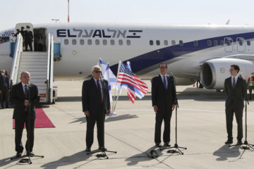 From left, IsraEl Al plane to Bahraineli National Security Adviser Meir Ben-Shabbat, U.S. Ambassador to Israel David Friedman, U.S. Treasury Secretary Steve Mnuchin, and U.S. Middle East envoy Avi Berkowitz, deliver statements before boarding Israeli flag carrier El Al plane to Bahrain, at Ben Gurion airport in Lod, near Tel Aviv, Israel Sunday, Oct. 18, 2020. (AP Photo/Pool/Ronen Zvulun)