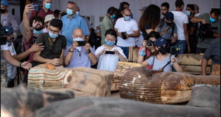 Egyptian archaeologists unveil 59 ancient coffins south of Cairo
