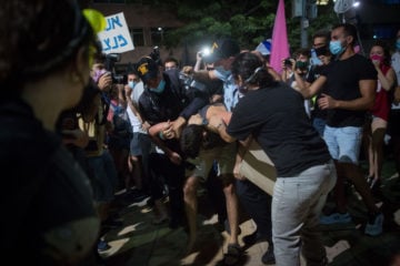 Police arrest protester in Tel Aviv