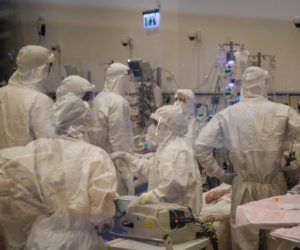 Medical staff wearing protective equipment in the coronavirus ward of Ziv Medical Center in Tzfat, Israel on October 7, 2020. (Flash90/David Cohen)