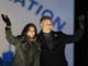 Democratic vice presidential candidate Sen. Kamala Harris, D-Calif., and her husband Doug Emhoff take the stage during a drive-in get out the vote rally, Monday, Nov. 2, 2020, in Philadelphia. (AP Photo/Michael Perez)