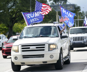 Supporters of President Donald Trump on Saturday, Nov. 14, 2020, in Miami. (AP Photo/Wilfredo Lee)