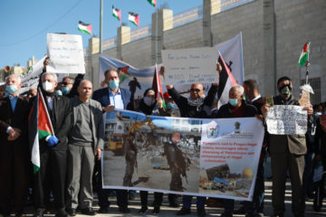 Palestinians protest against US Secretary of State Mike Pompeo's visit to the Jewish settlement of Psagot near the Ramallah suburb of Al-Bireh, on November 18, 2020. (Flash90)