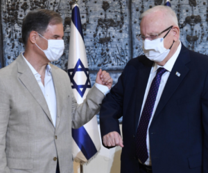 President Reuven Rivlin congratulates Eytan Stibbe, at a press conference in Jerusalem announcing that Stibbe will be Israel's second-ever astronaut, on November 16th, 2020. (Twitter/Reuven Rivlin/Screenshot)