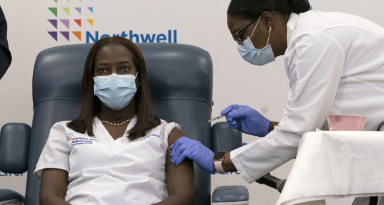 Opinion: US moving toward race-based vaccine rollout?