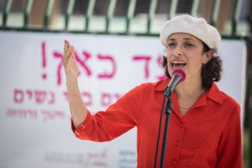 MK Tehila Friedman speaks at a demonstration calling for more women in the Israeli government decision making process, outside the Knesset, in Jerusalem, on November 23, 2020. (Flash90/Hadas Parush)