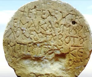 Stone bearing inscription