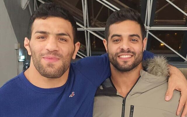 Israelis give exiled Iranian judoka big embrace as he arrives for tournament