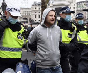 Virus Outbreak Britain Europe Protests