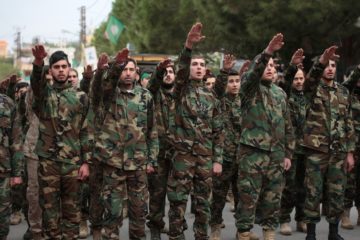 Hezbollah terrorists salute