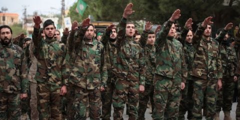 Hezbollah terrorists salute