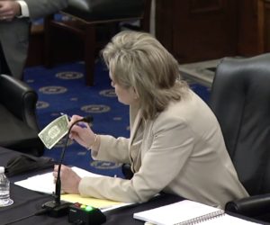 U.S. Sen. Cindy Hyde-Smith with dollar bill