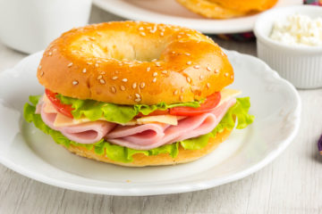 Non-kosher bagel with ham and cheese