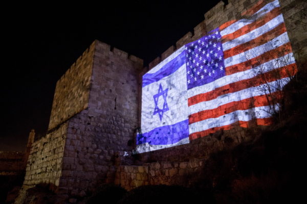 Israeli and American flags