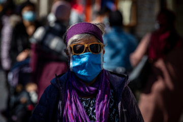 Jerusalemites wearing face mask