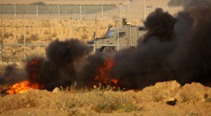 Gaza terrorists torch Israeli vehicle