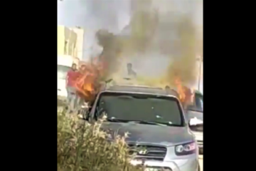Palestinians burn SUV used in shooting attack