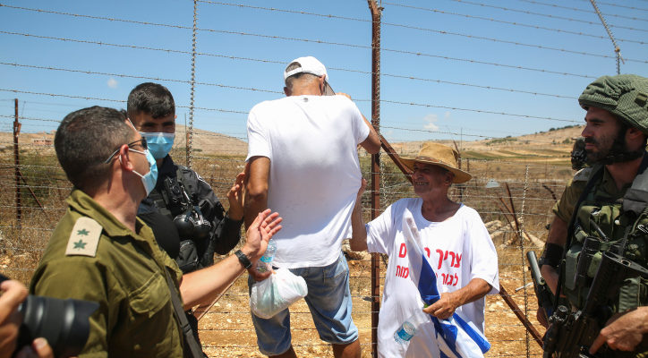 Raging Israeli farmers storm Lebanese border fence during protest