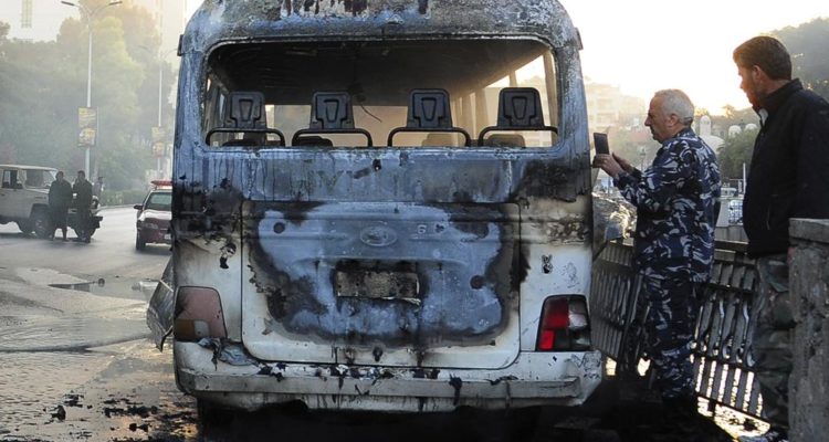 Syria ties Israel to Damascus bus bombing that killed 14 soldiers
