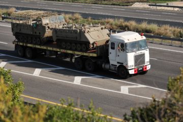 IDF_Tank_transporter_White_GMC_with_M113_and_M548-Alfa