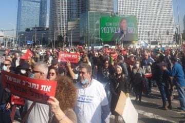 Tour guides gather in Tel Aviv, Dec 27, 2021, to protest the continued shutdown of tourism. Photo: courtesy
