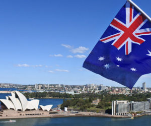 The,National,Flag,Of,Australia,Flies,Above,Sydney,Harbor,And