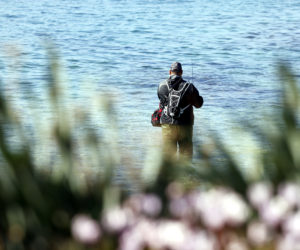 A man fishing on the Hadera Beach